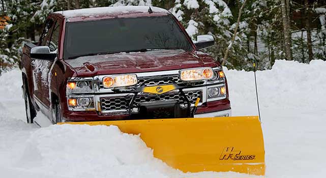 Fisher HT-Series plow on a 2014 Chevrolet Silverado 1500. 